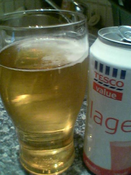 Tesco Value Lager poured into a glass